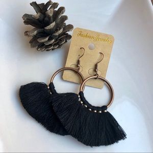 Black statement tassel pierced earrings